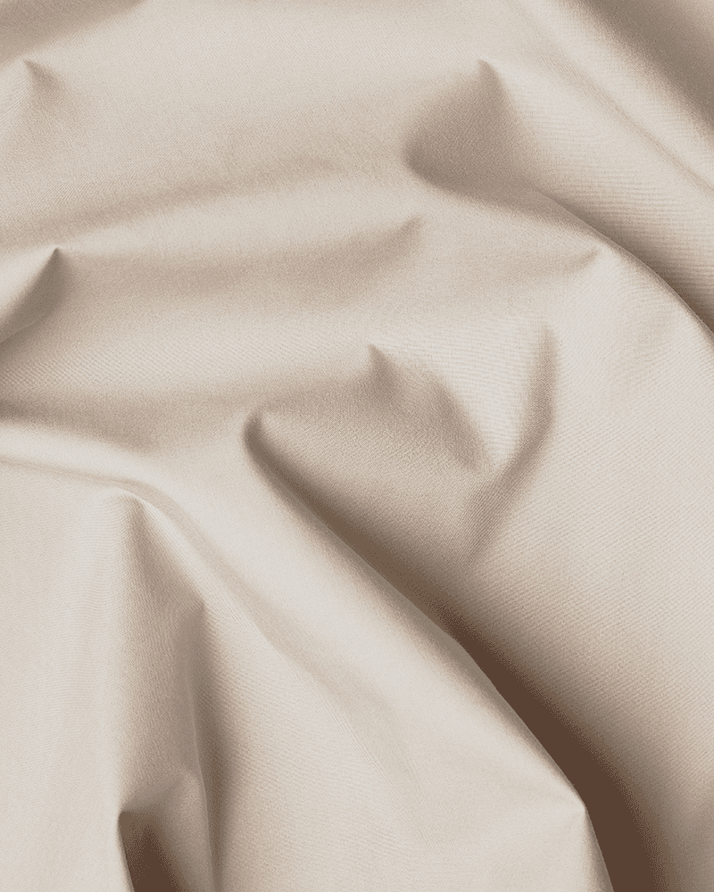 Close-up van het beige OEKO-TEX®-gecertificeerde katoen van de bedrok